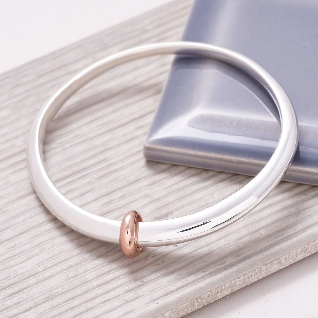 Eclipse Chunky Oval Designer Silver Bangle with solid gold loop for smaller hands Scarlett Jewellery