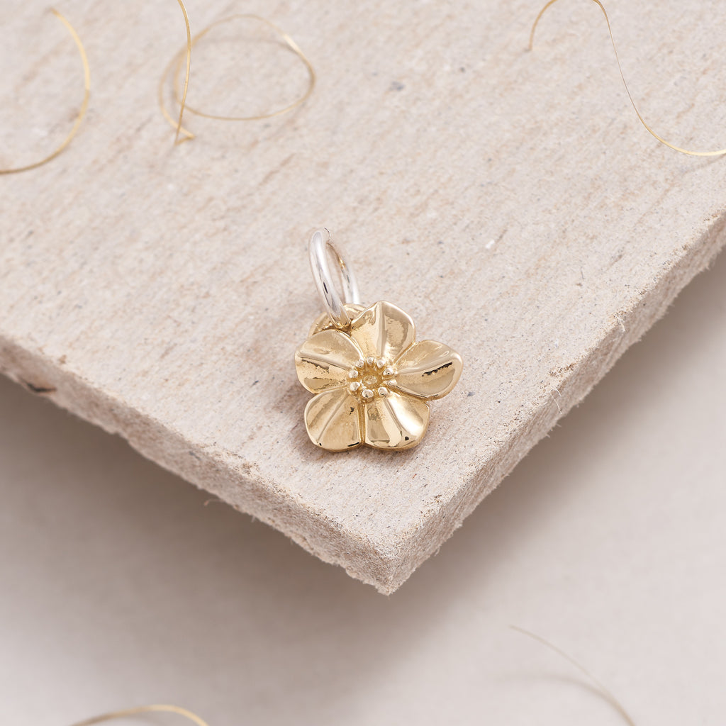 Solid 9 carat yellow gold forget me not flower charm Scarlett Jewellery