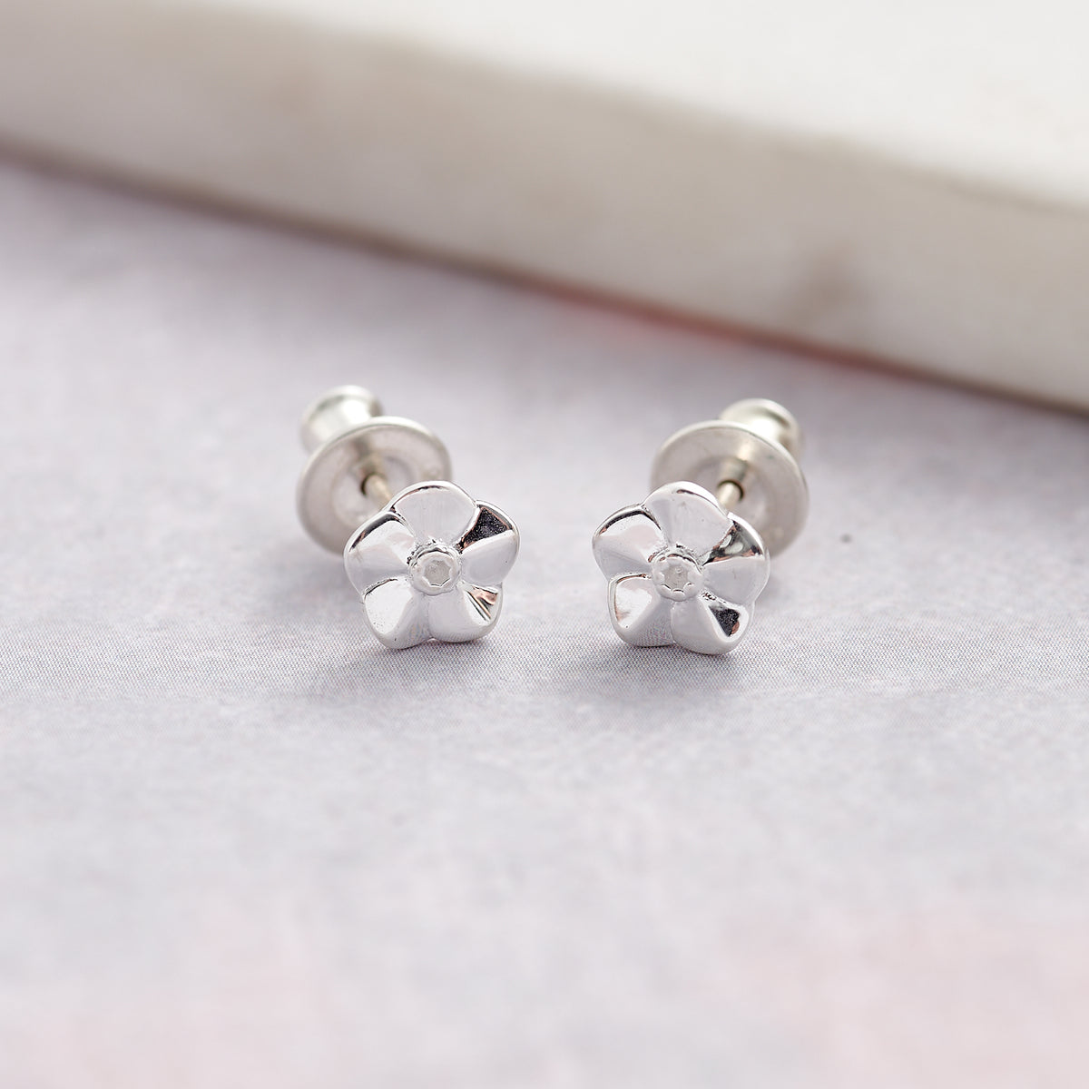 tiny silver forget me not flower stud earrings for women and girls scarlett jewellery brighton