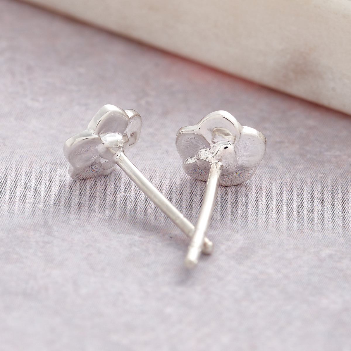 heart on back of tiny silver forget me not flower stud earrings for women and girls scarlett jewellery brighton