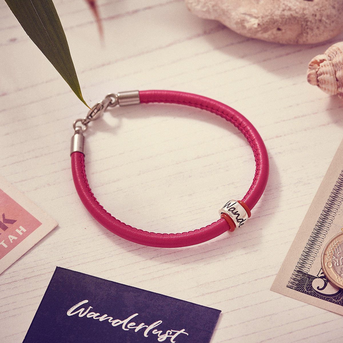 ladies pink leather bracelet with wanderlust bead unusual travel gift for her