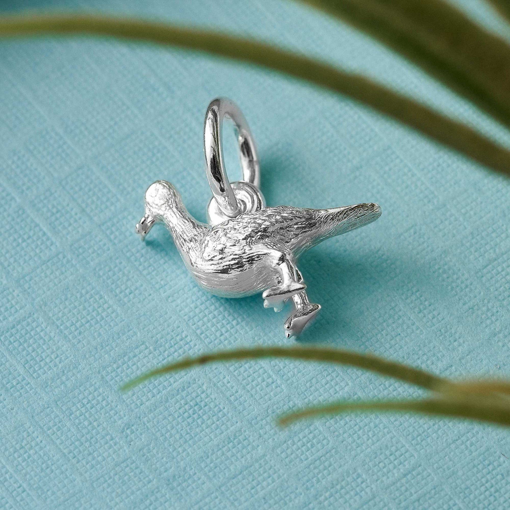 silver seagull charm from brighton jeweller scarlett jewellery stolen chip