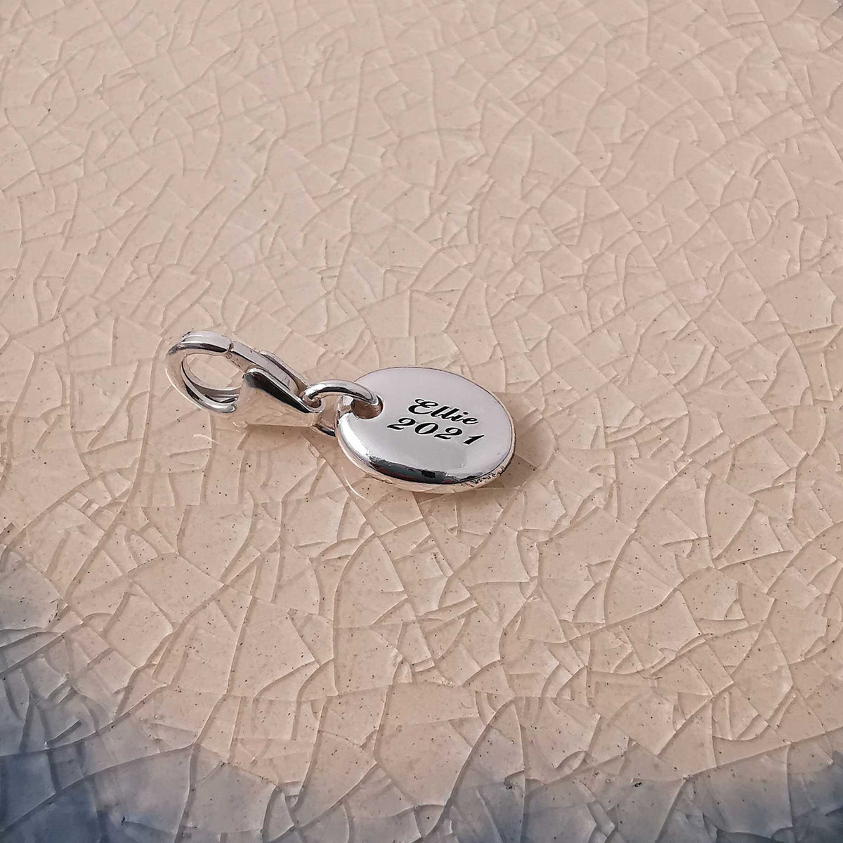 engraved silver pebble charm with clip clasp name and date birthday gift for charm bracelet