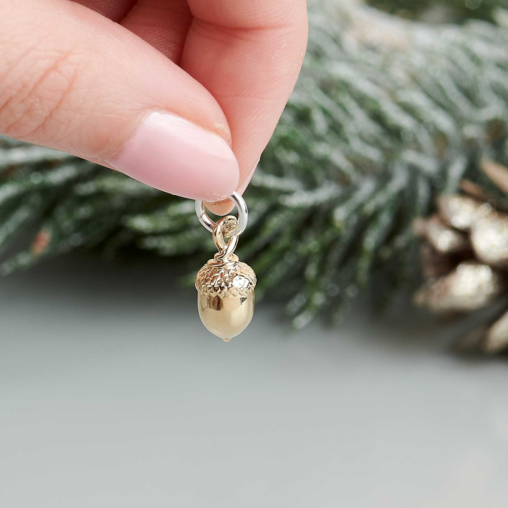 Solid gold acorn charm for bracelets and necklaces by Scarlett Jewellery