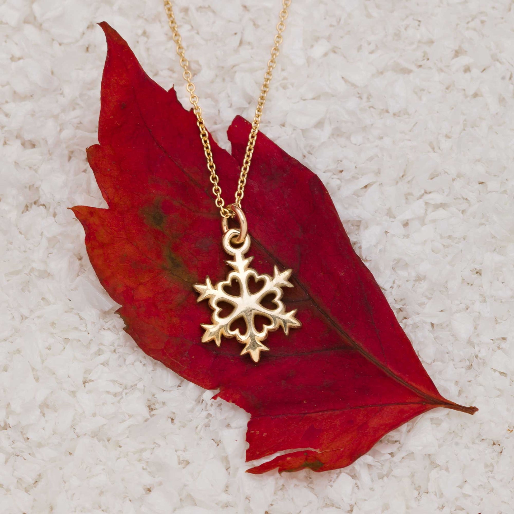 solid gold snowflake charm necklace