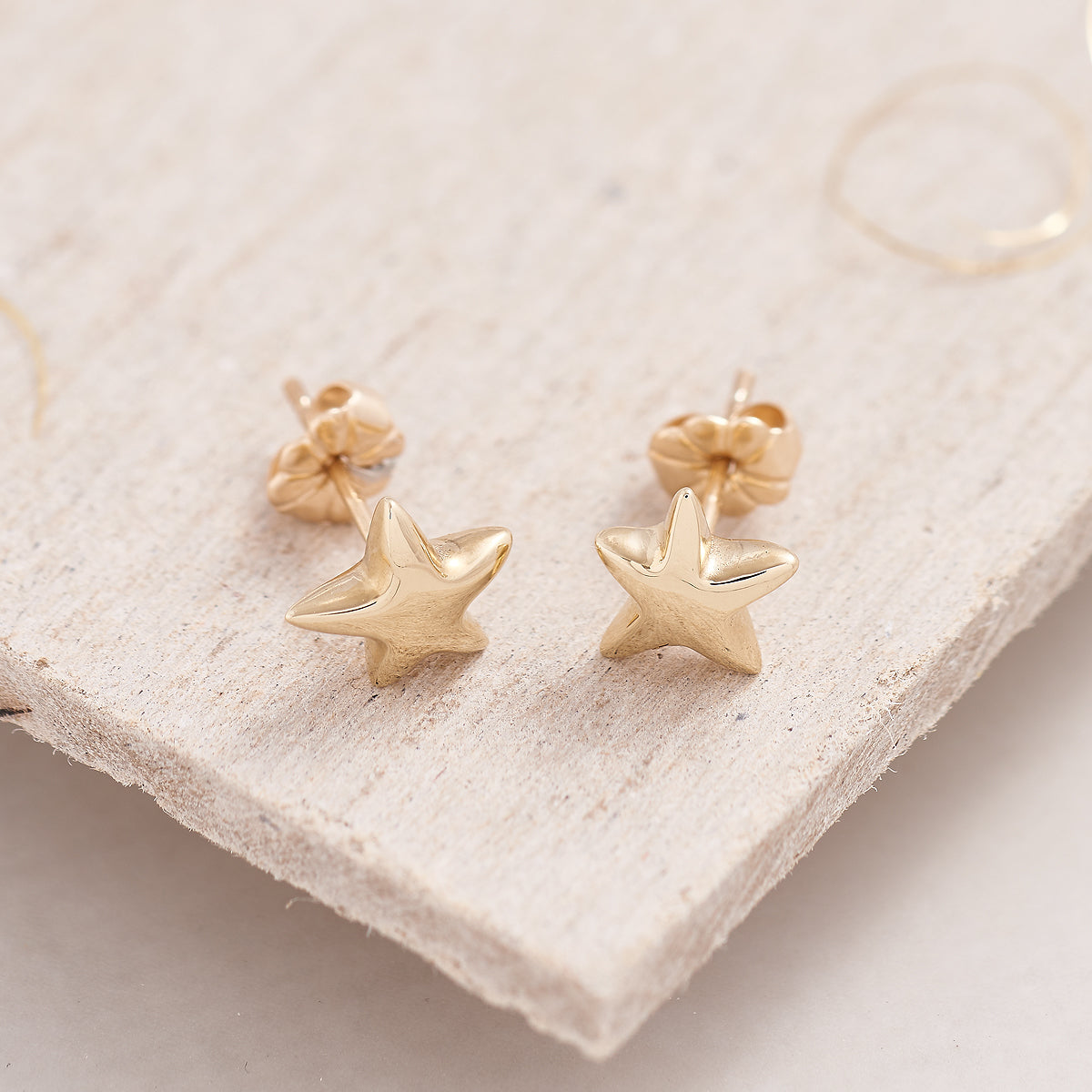 Solid recycled gold star stud earrings made in UK Scarlett Jewellery designer