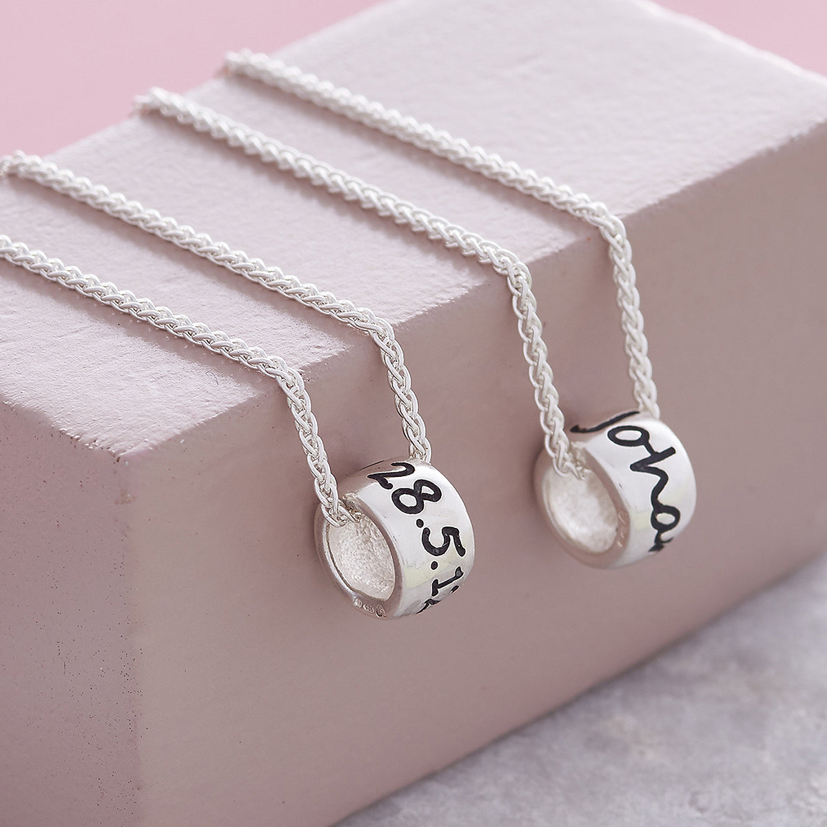 Personalised Silver Engraved Charm Bead Designer Charms on a silver necklace