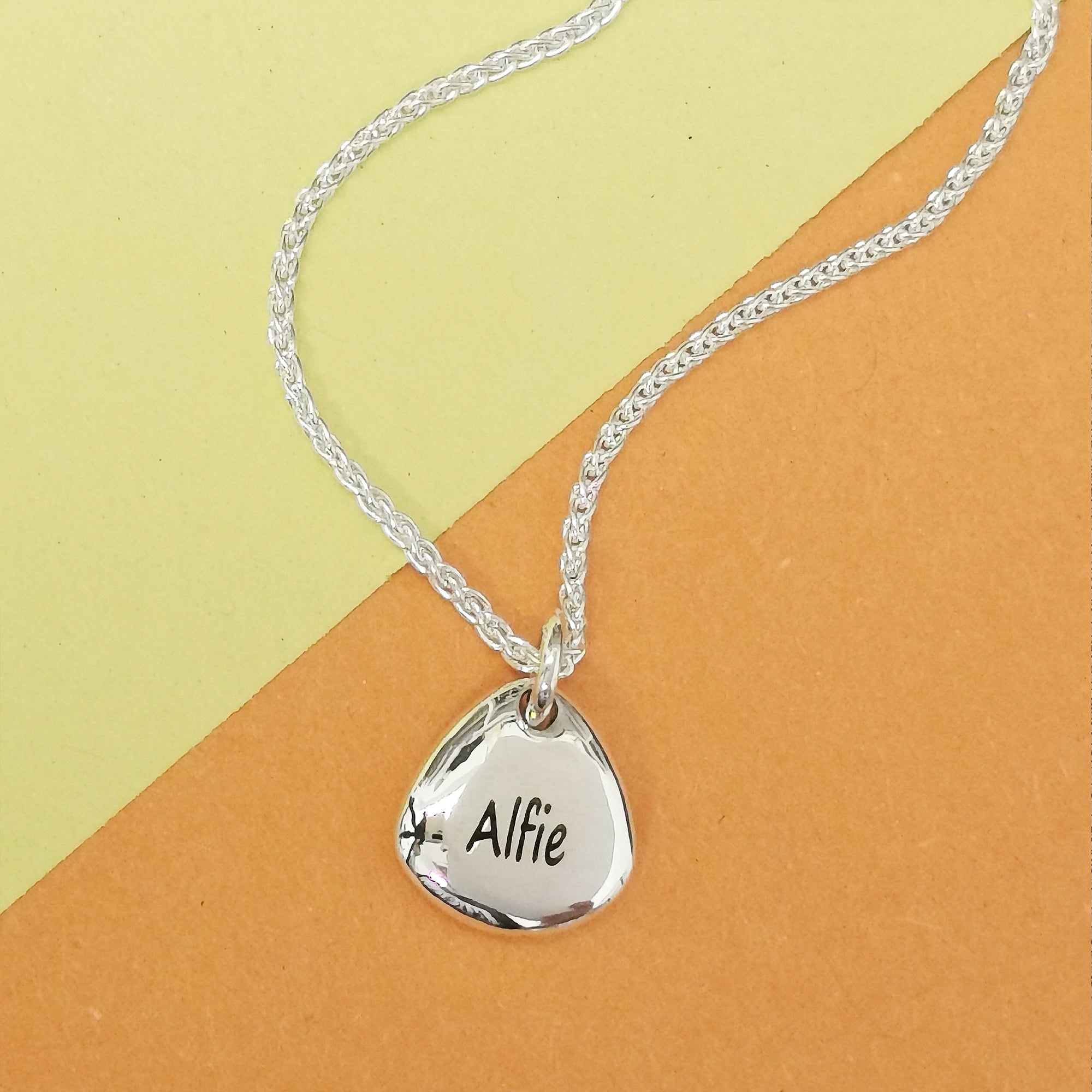 back of pet paw charm engraved with pets name memorial gift pet loss
