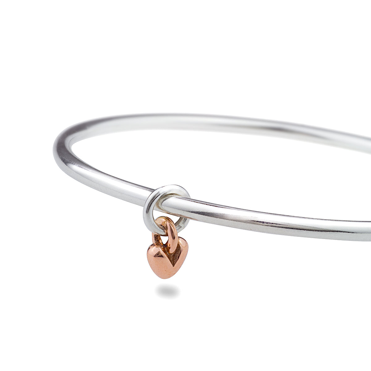 solid silver bangle with recycled rose gold heart charm made in the UK Scarlett Jewellery