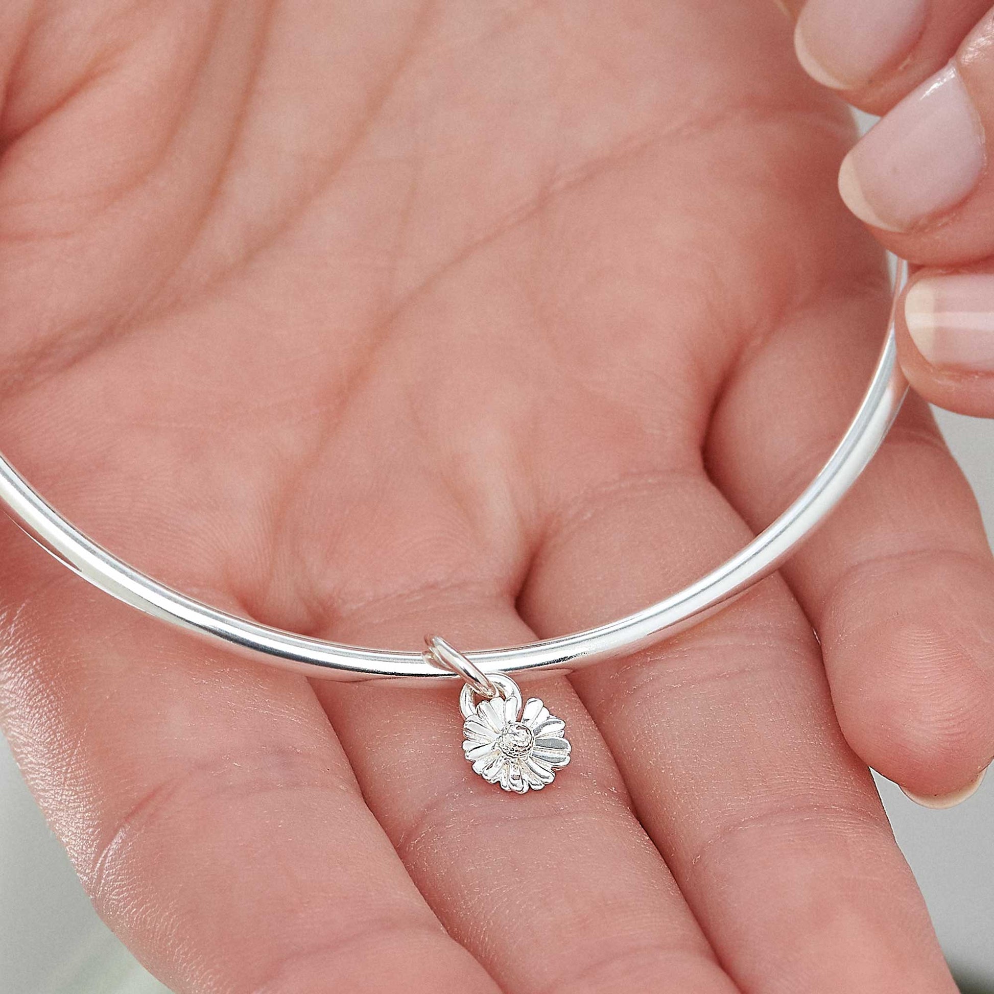 tiny daisy flower silver bangle nature inspired jewellery chelsea flower show scarlett Jewellery